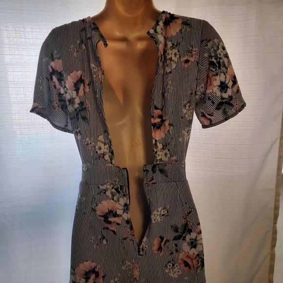 Crystal Doll Black White Ruffled Wrap Romper - Picture 2 of 10